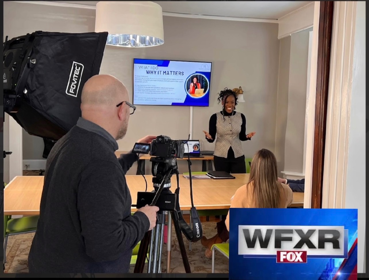 Nakeita Stewart being filmed for WFXR Fox News commercial segment